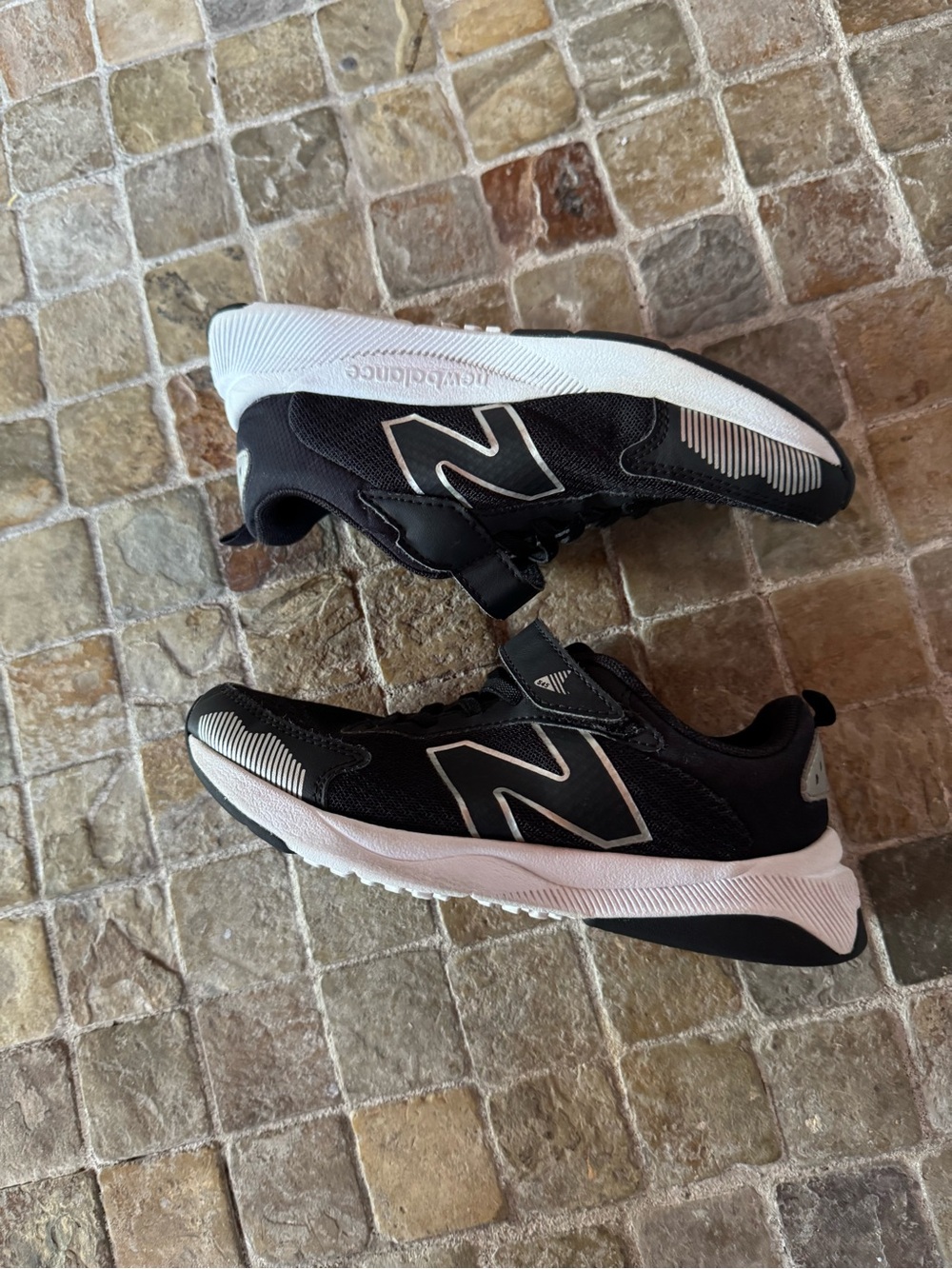 New Balance kids Black & White Running Sneakers (size 1 wide )